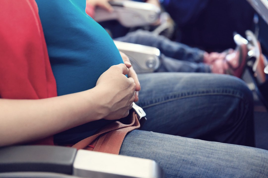 Pregnant woman on a plane